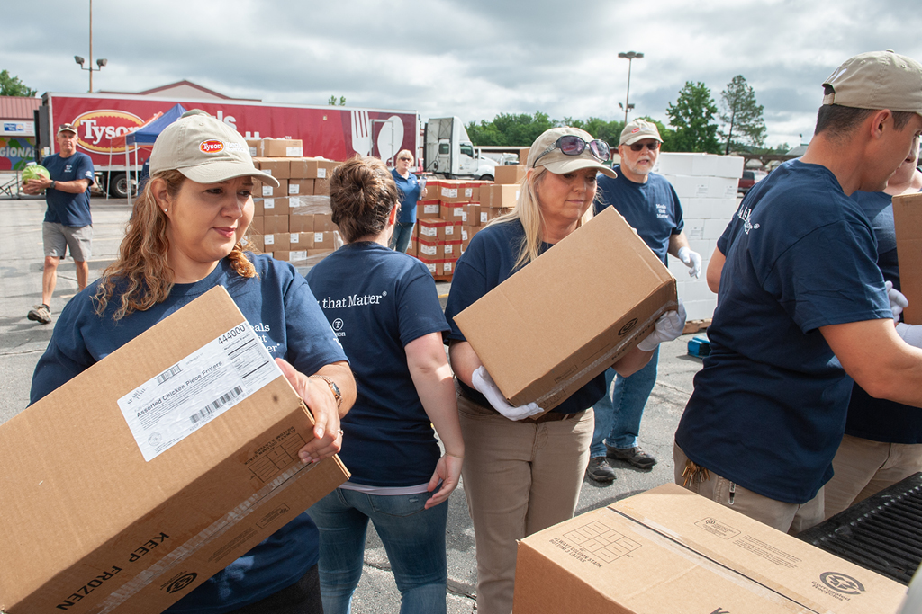 This is a photo of team members working for a hunger relief effort.