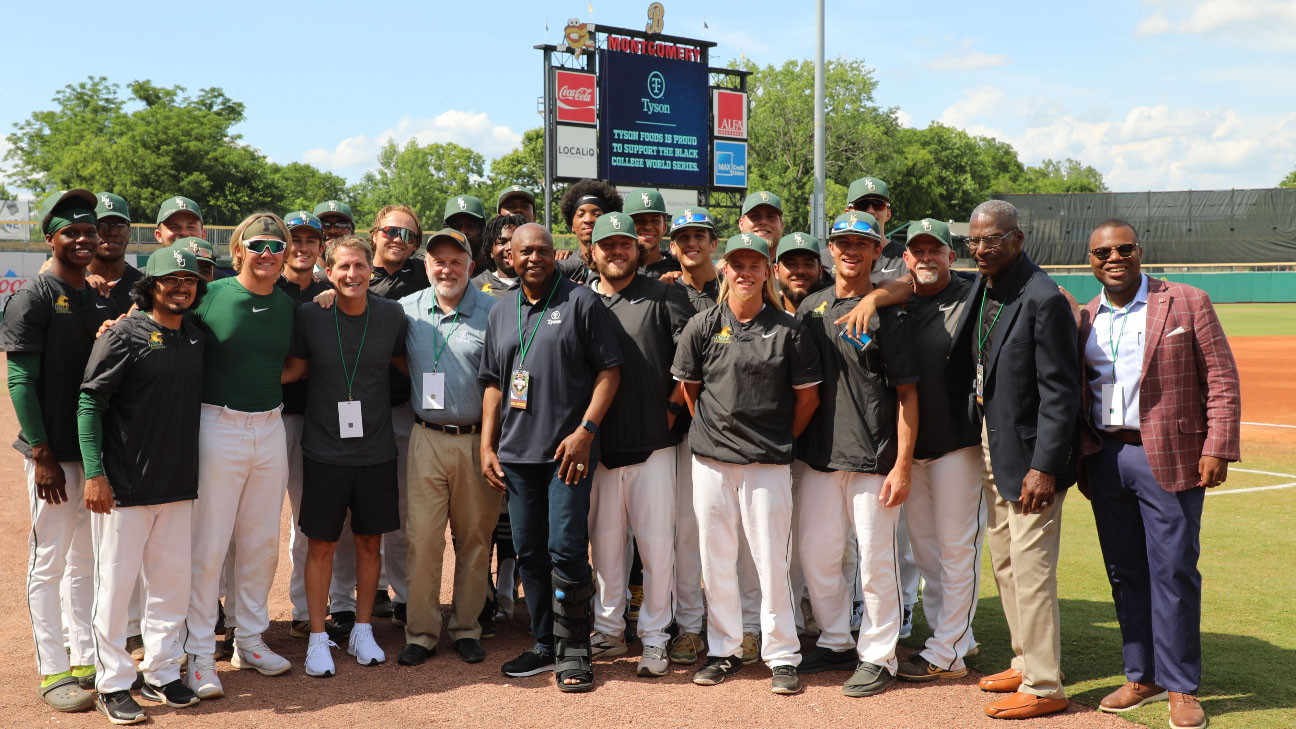 This is a group picture of men at a baseball game.