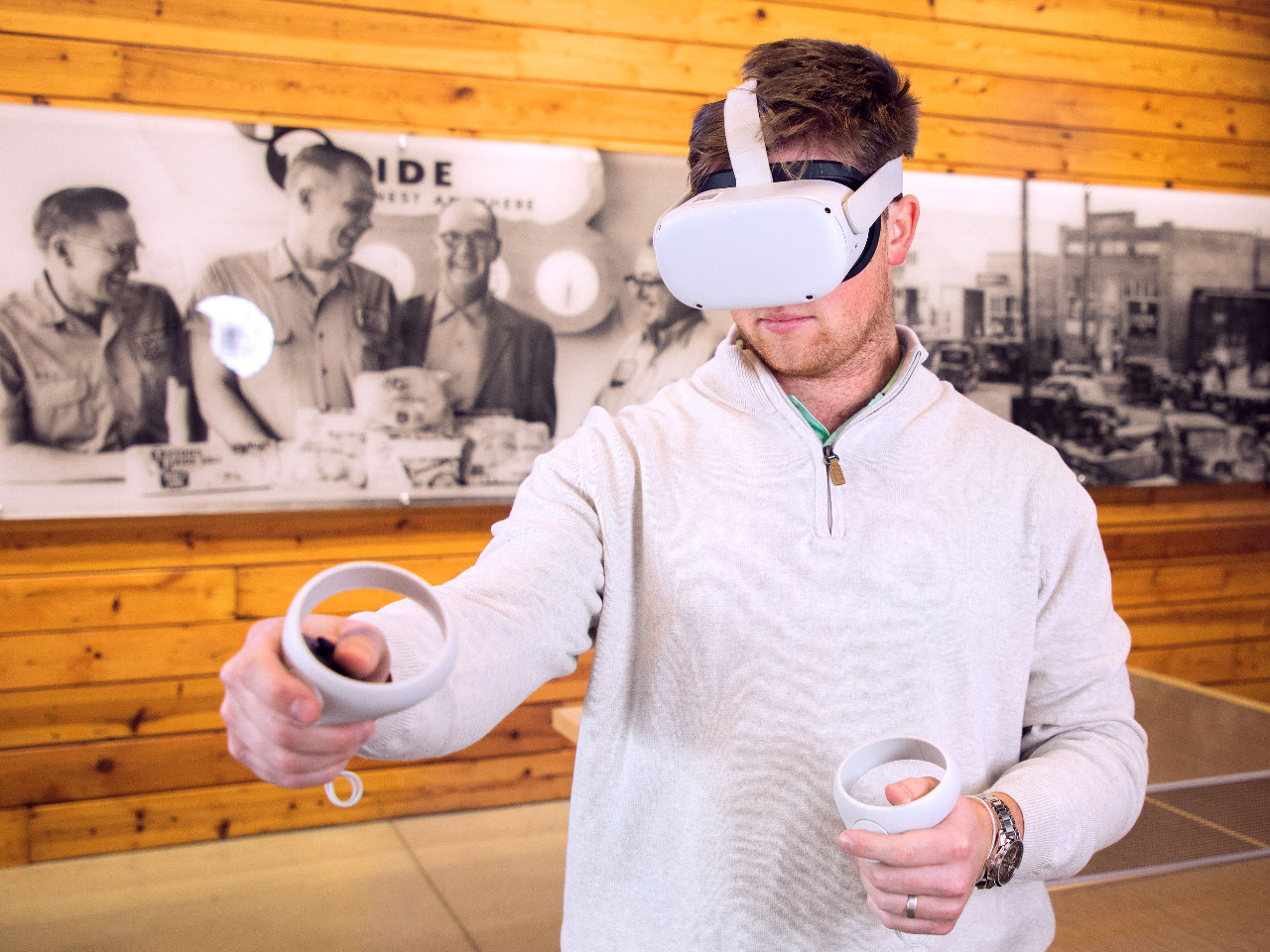 IT Jobs at Tyson This is a photo of a man wearing a VR helmet.