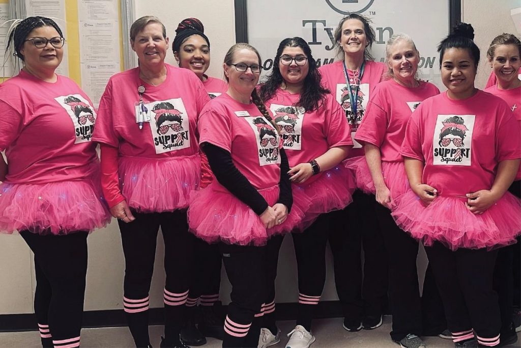 Mammogram-Angie This is a group photo of team members dressed in pink.